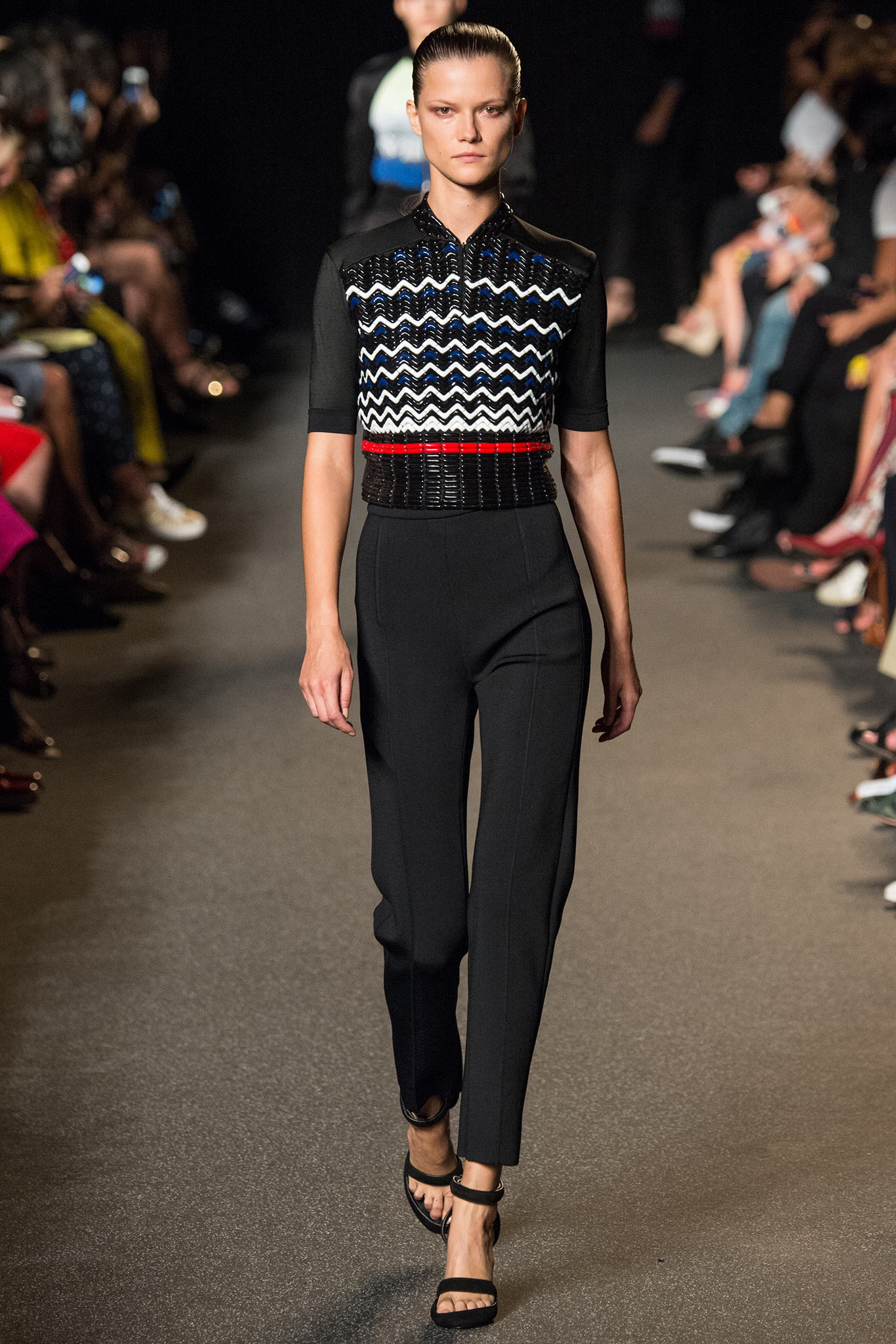 fitted black and white top with tailored pants