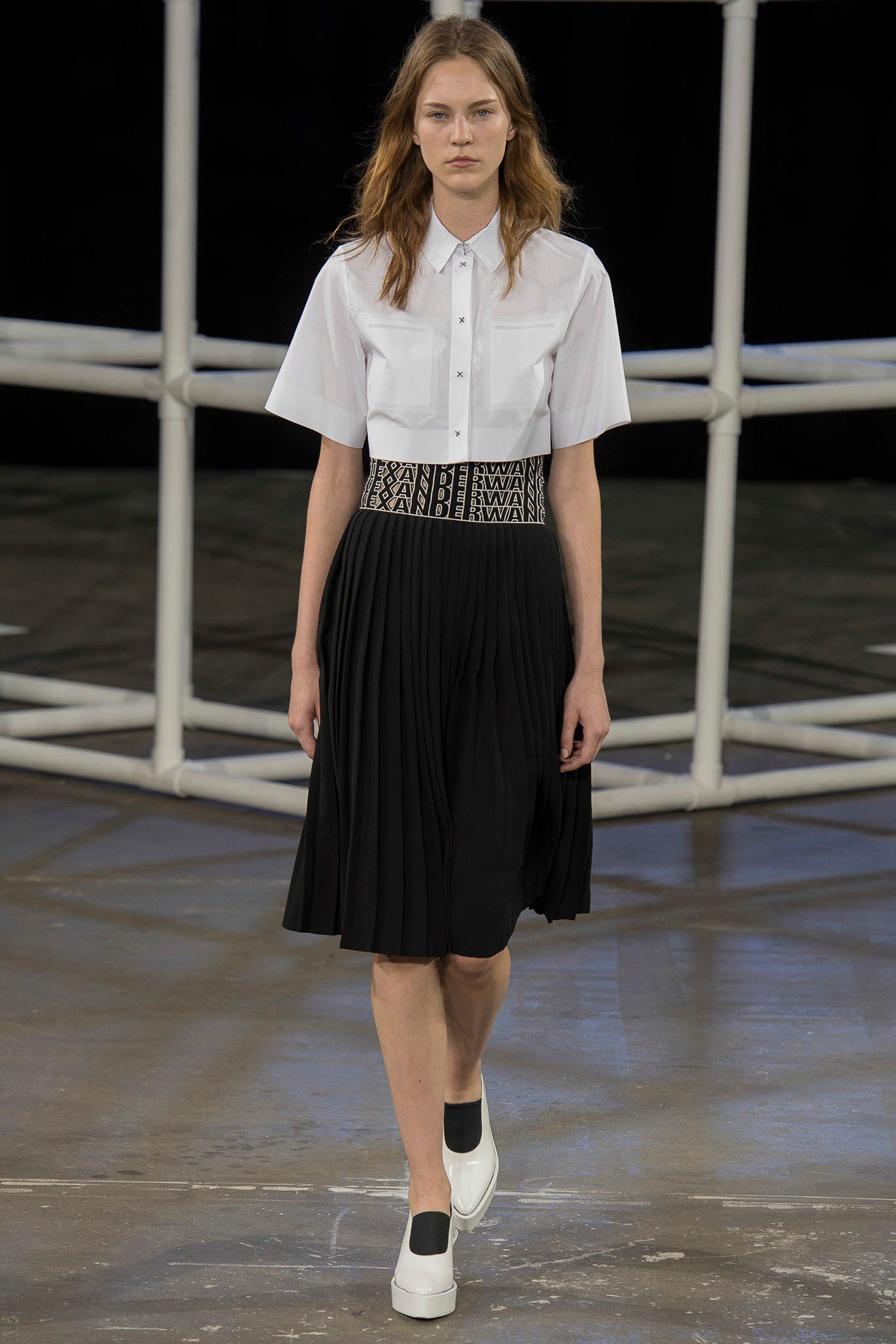 black relaxed pleated midi skirt