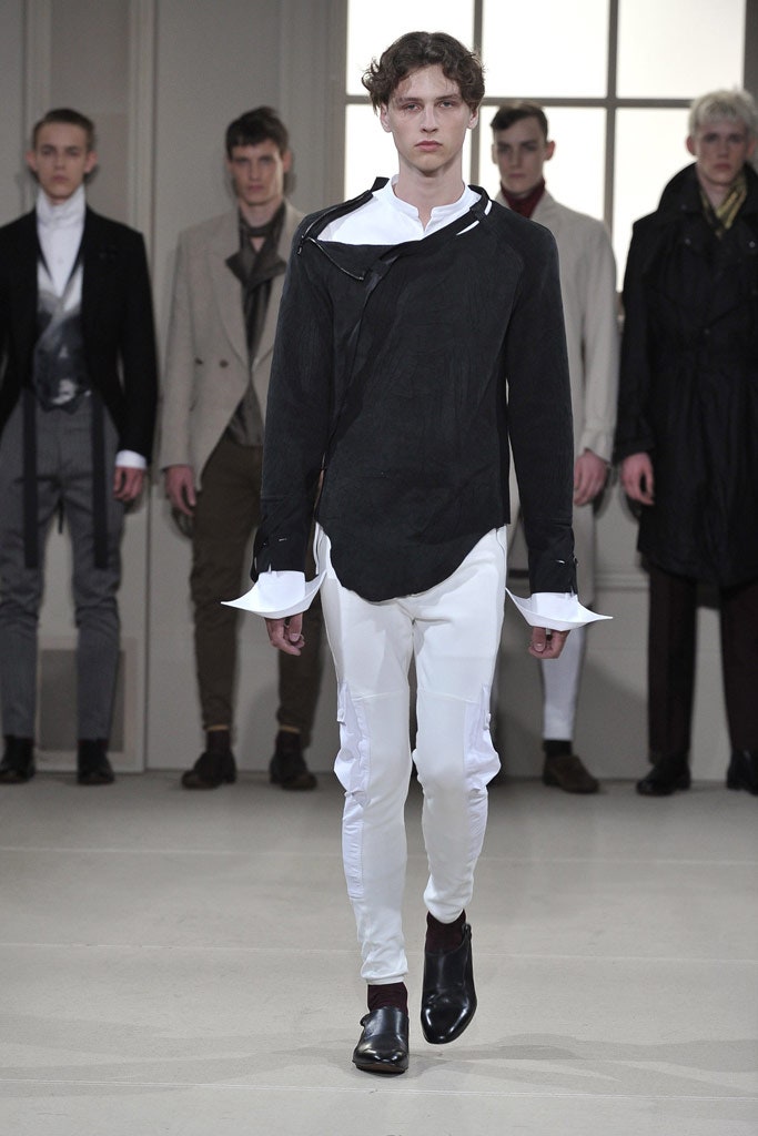 black shirt white pants outfit