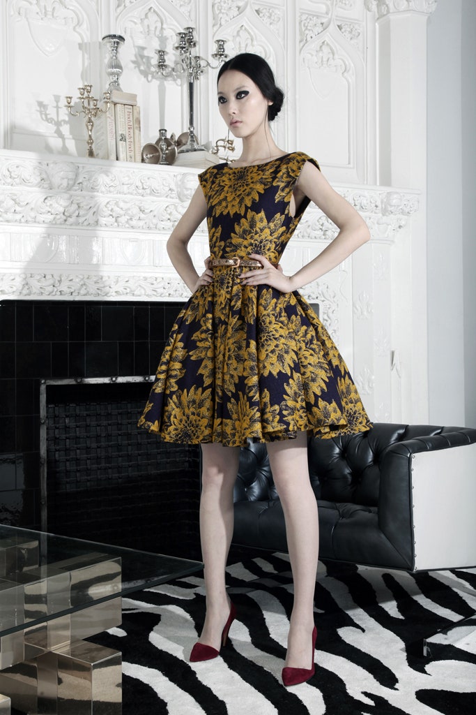 black and gold printed mini dress