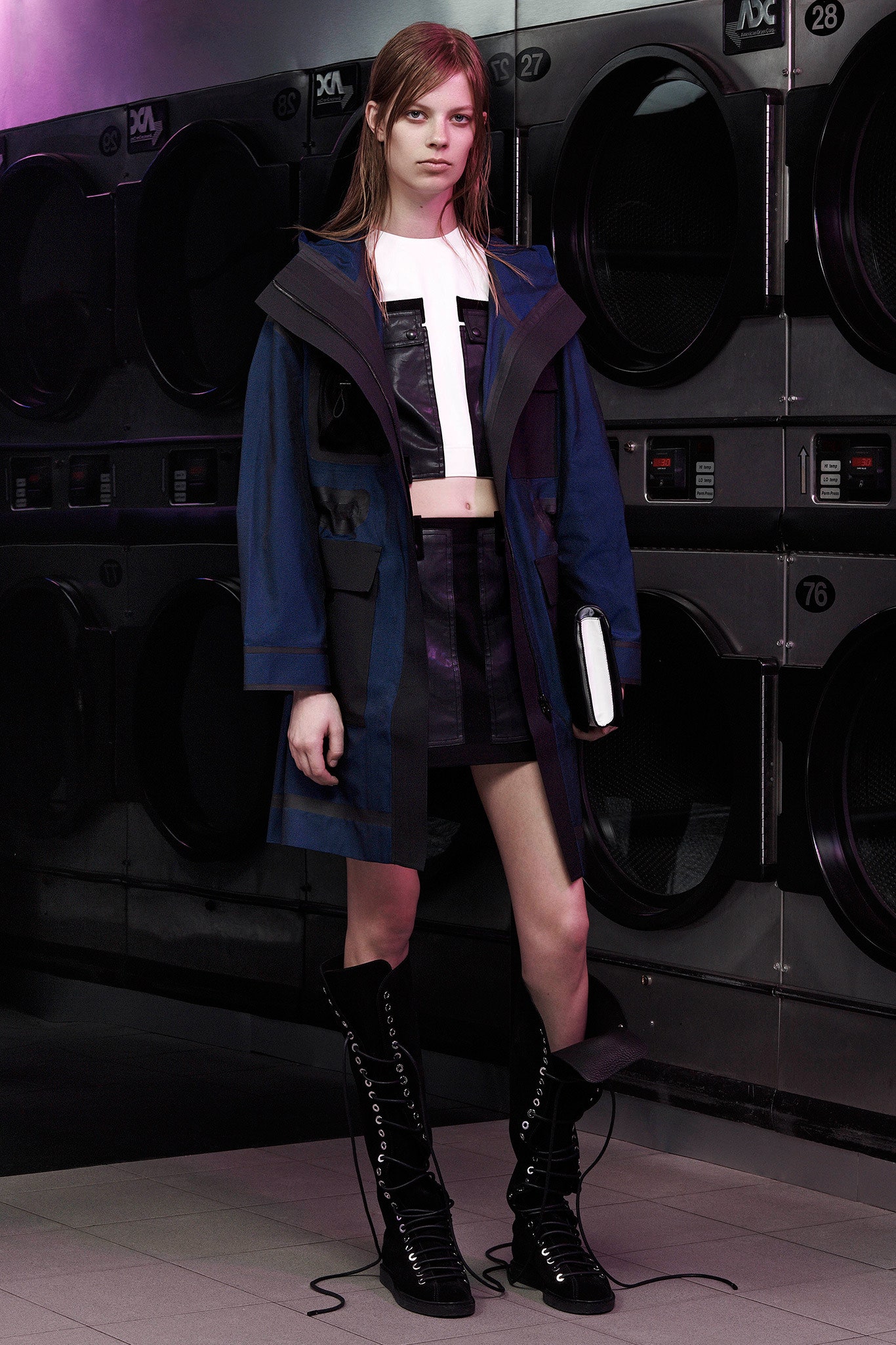 blue coat with black leather skirt
