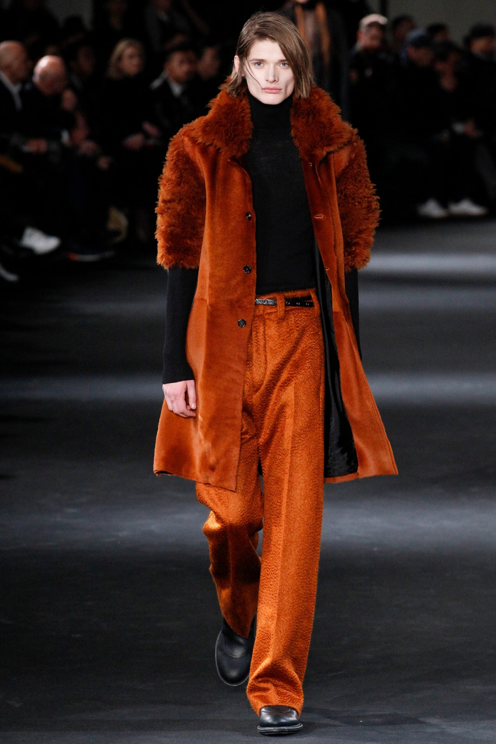 orange fur coat with black top