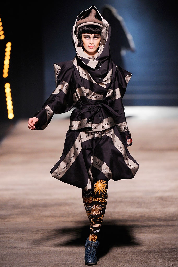 black and white layered coat with printed leggings
