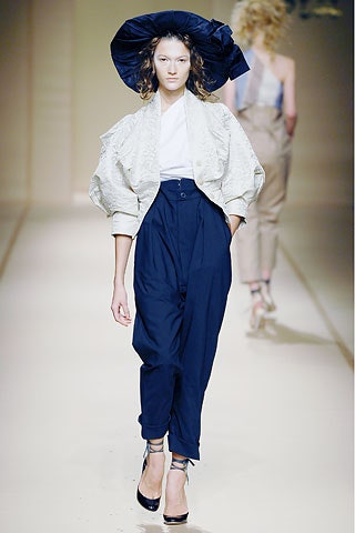 white silk relaxed jacket with navy pants