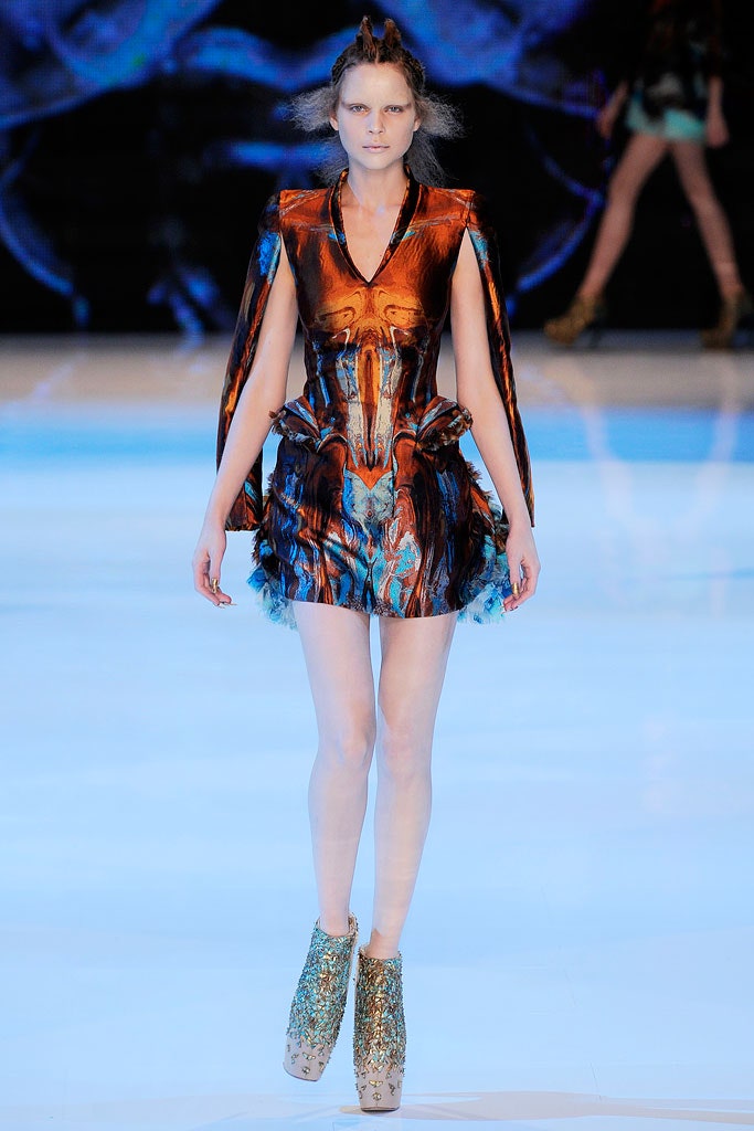 orange silk sleeveless high-neck fitted flared draped dress