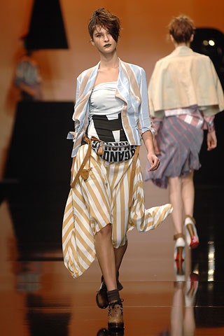 blue silk blouse and pleated skirt