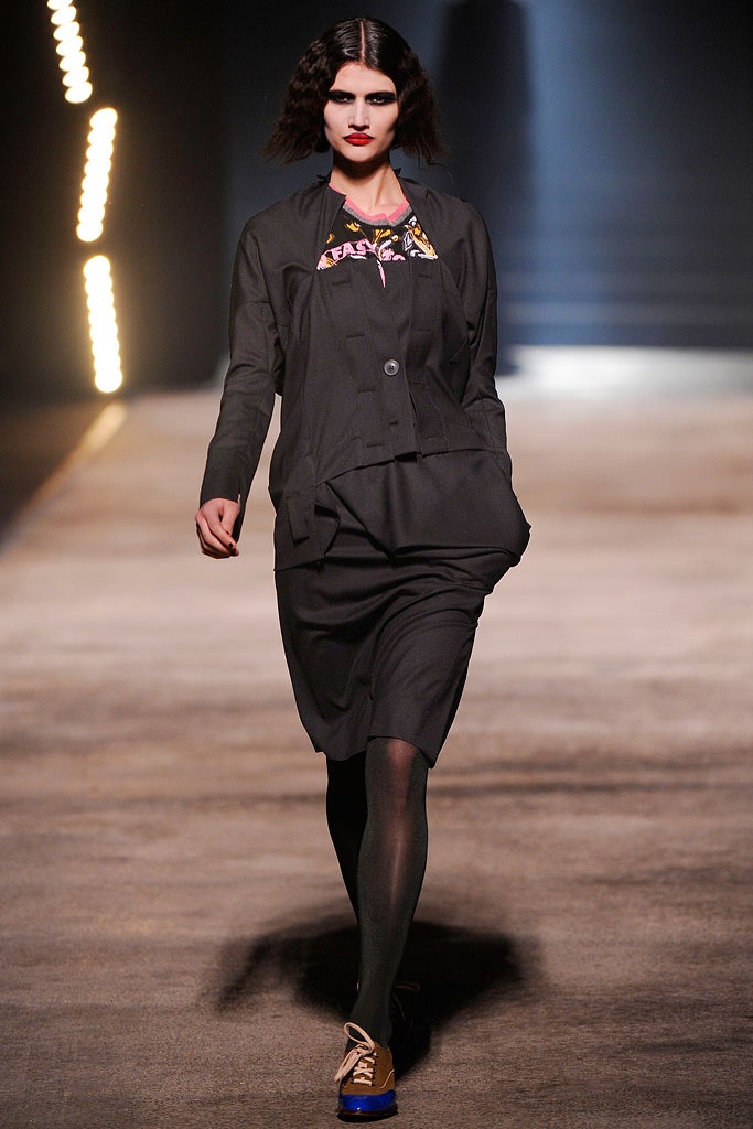 black relaxed jacket and fitted dress