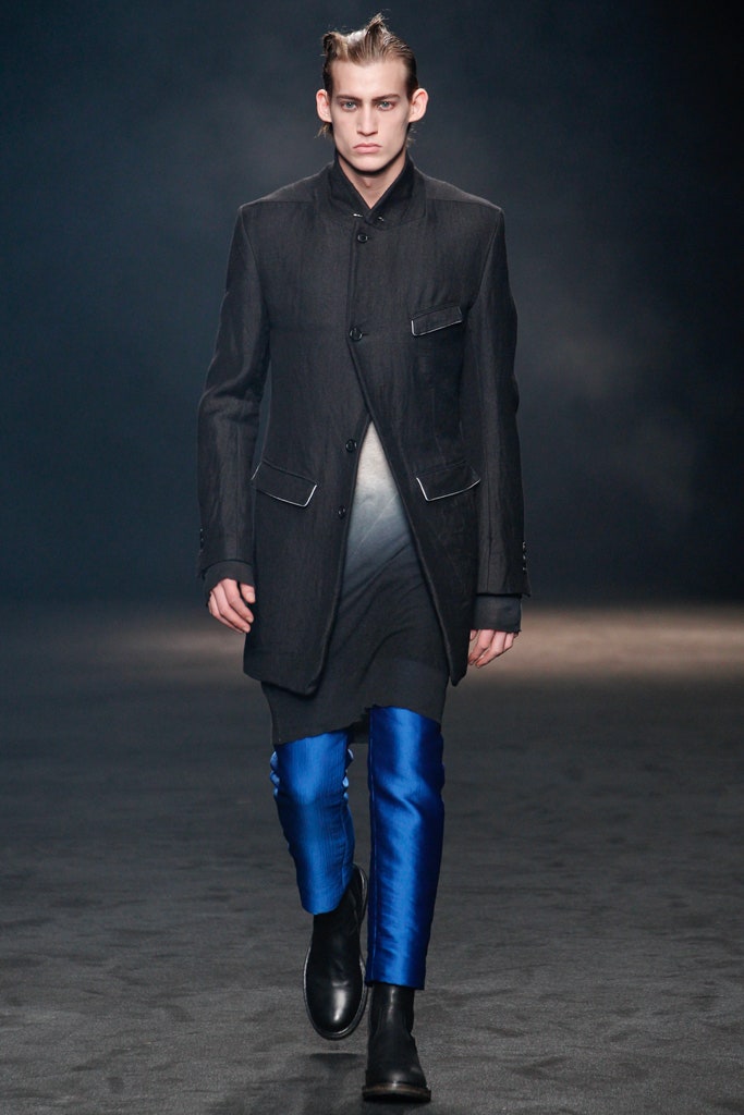 black wool coat with blue pants