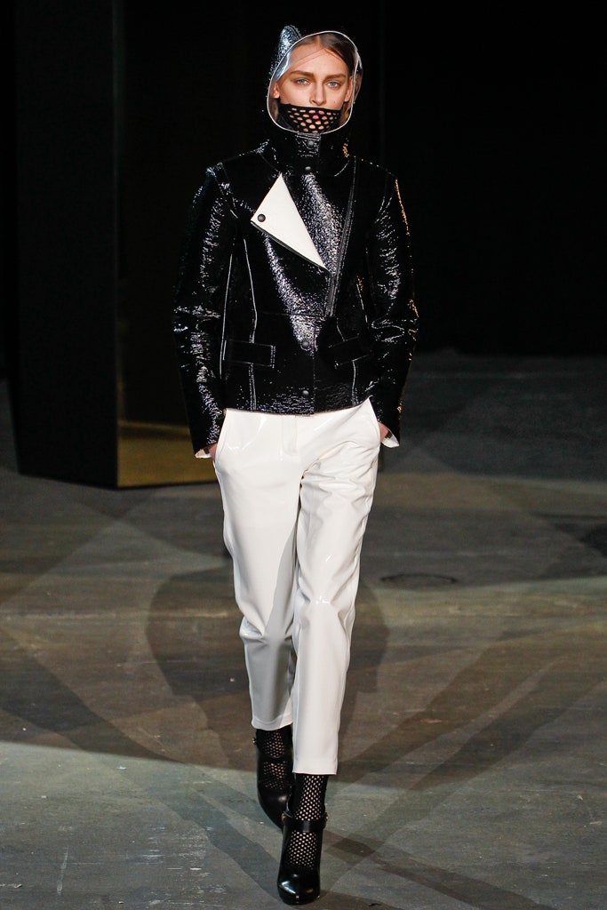 black vinyl fitted jacket with white pants