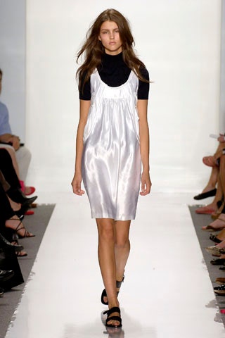 white silk fitted dress with black top