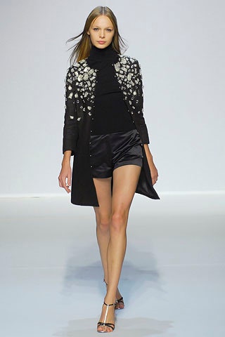 black embroidered coat and shorts