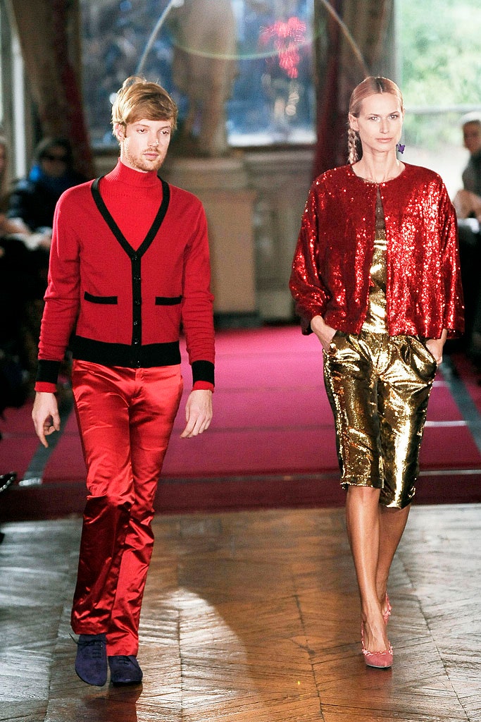 red cardigan and gold dress