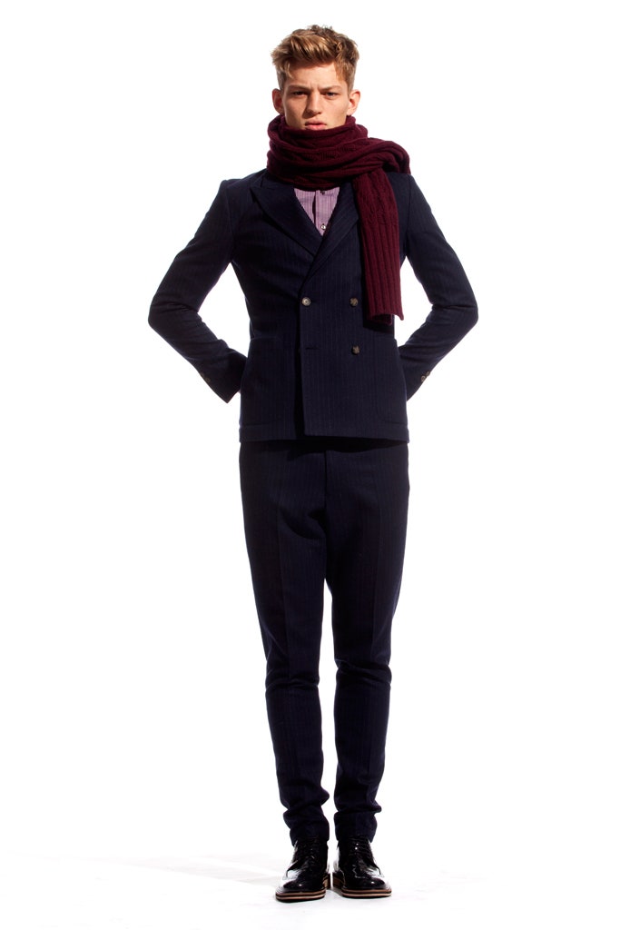 navy tailored suit with burgundy scarf