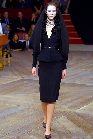 black fitted midi dress with cape