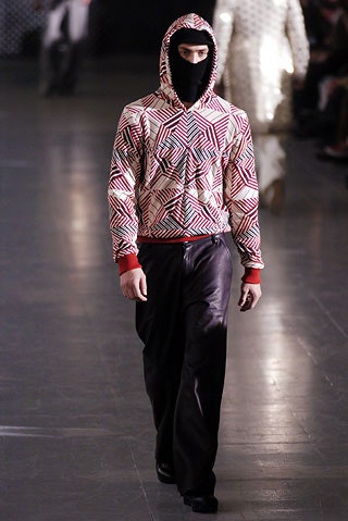 printed red hoodie with black pants