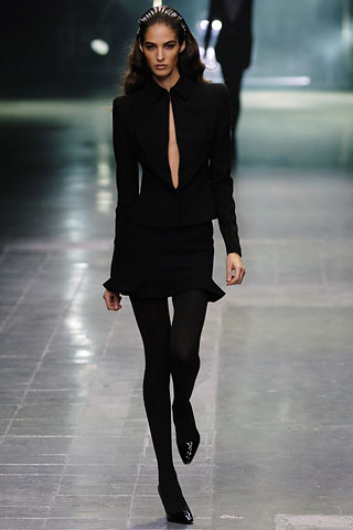 black fitted blazer and mini skirt