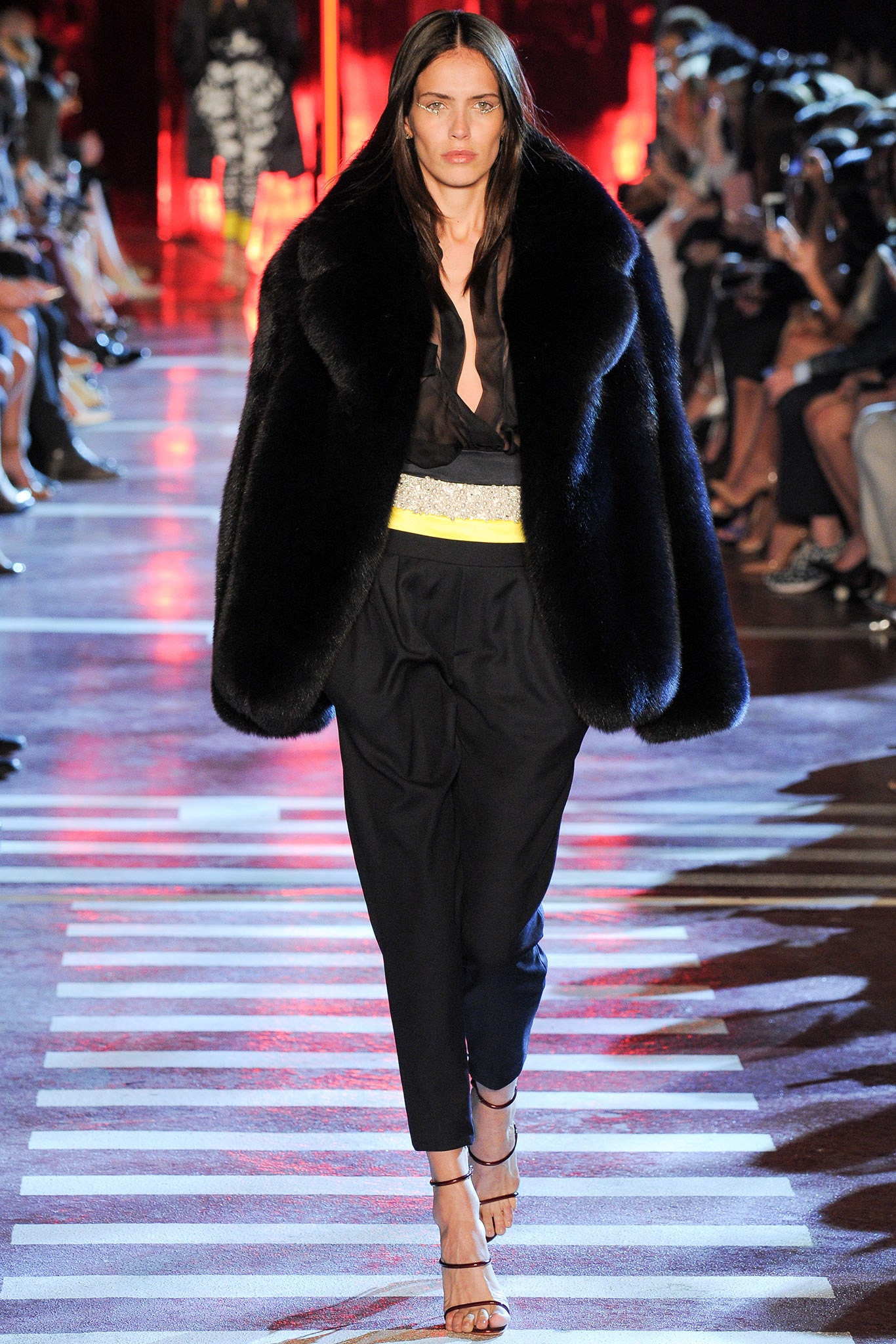 black oversized fur coat with fitted blouse