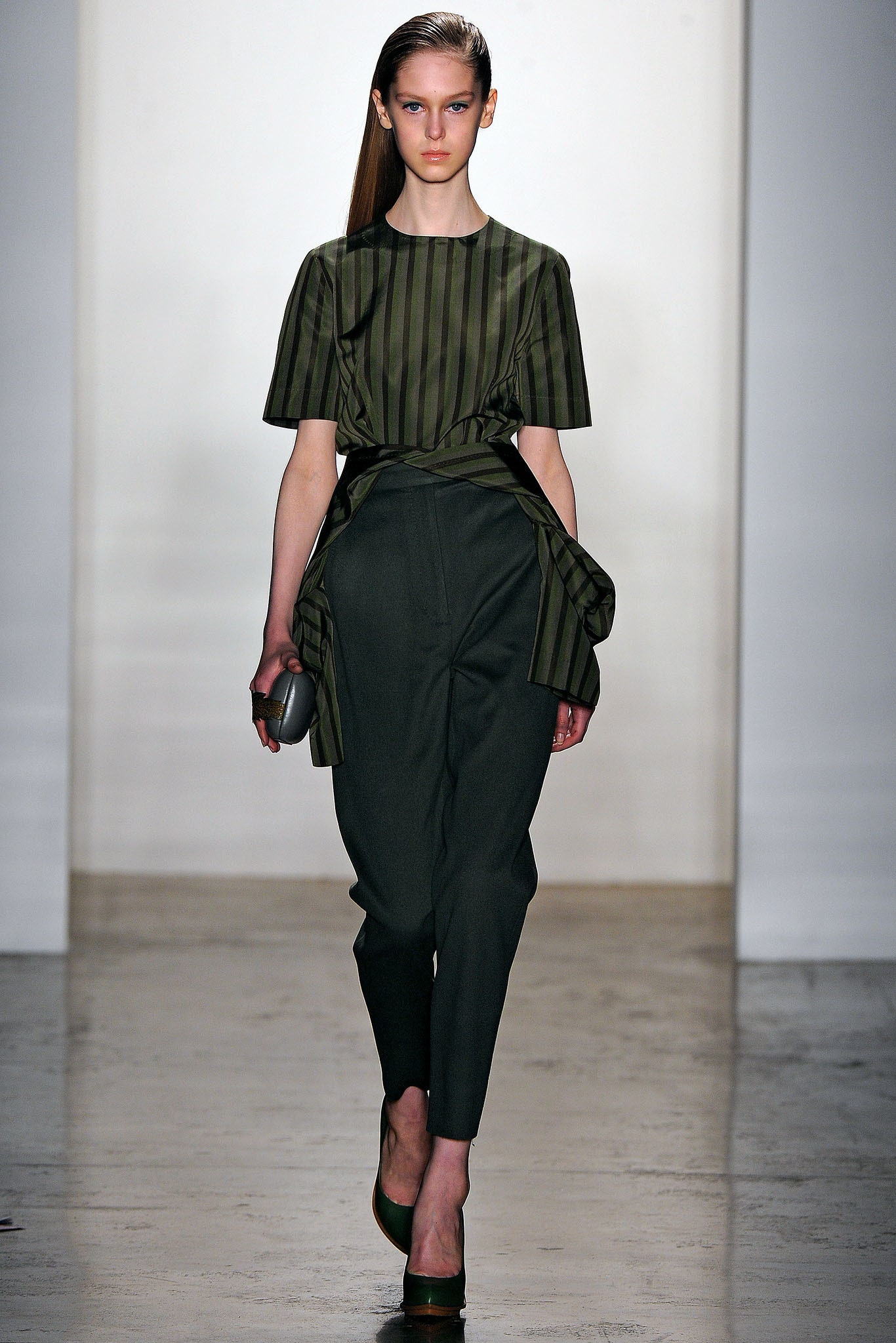 green striped top and tailored pants