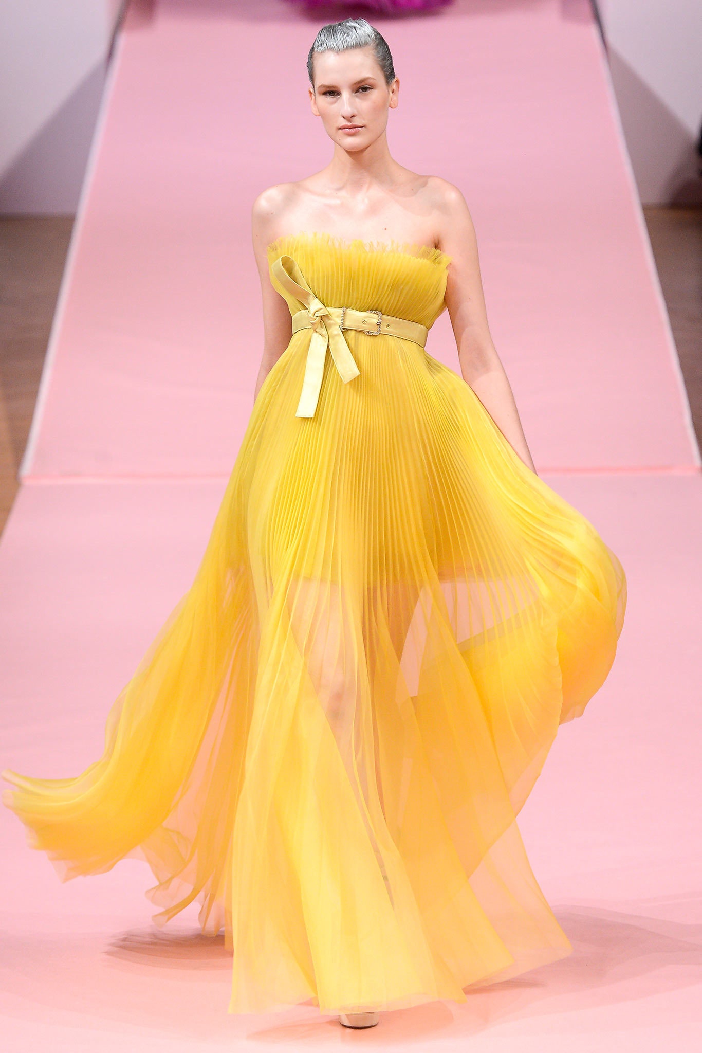 yellow pleated strapless gown