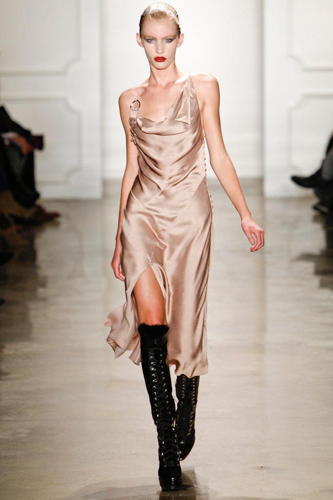 beige silk asymmetric dress with black boots