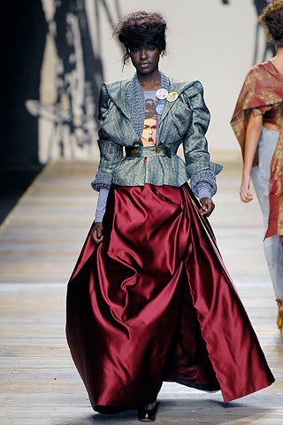 gray structured jacket and red skirt