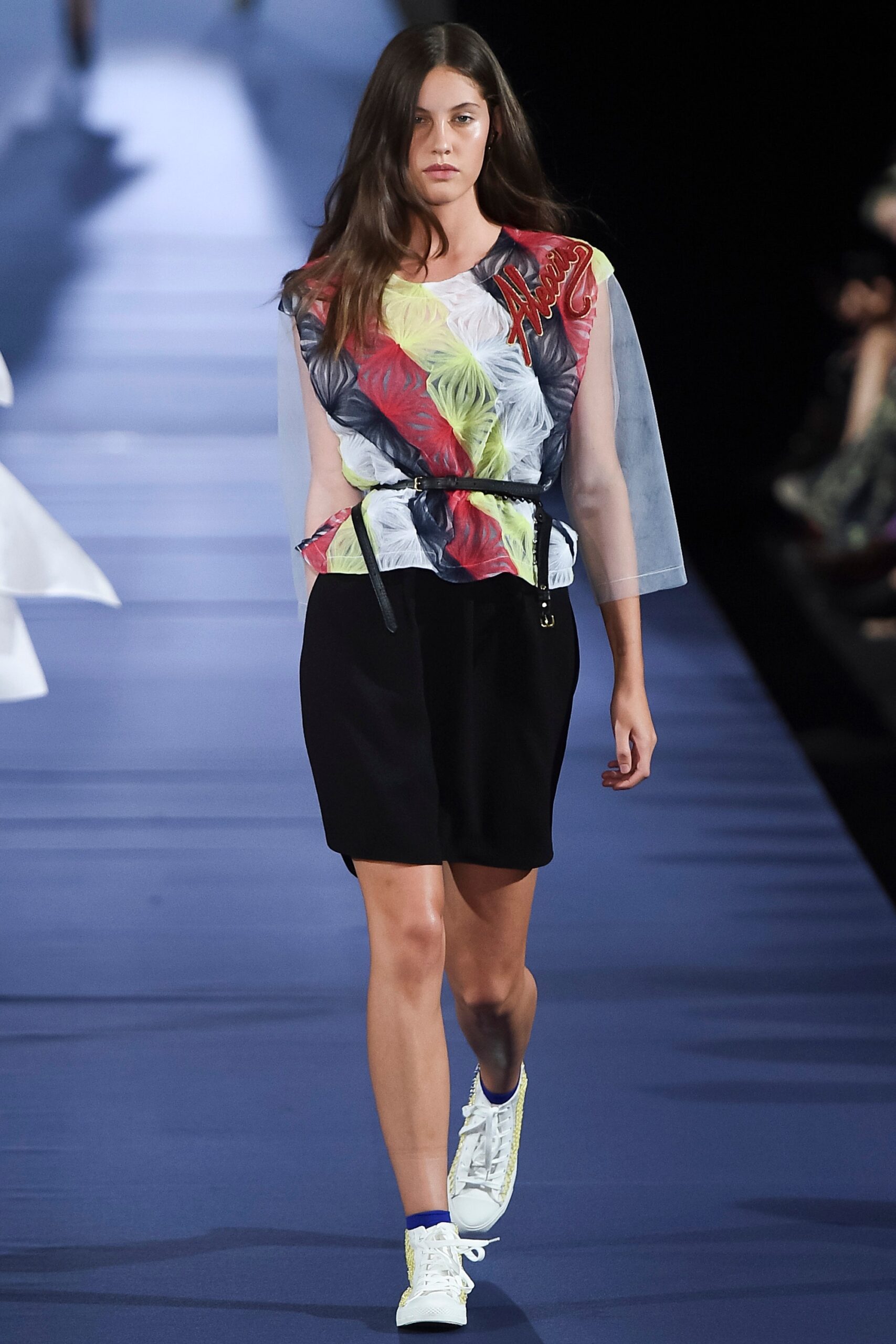 printed top with black skirt