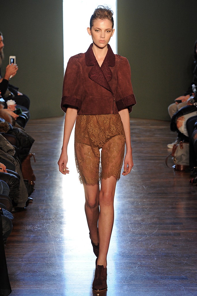 brown fitted jacket with lace shorts