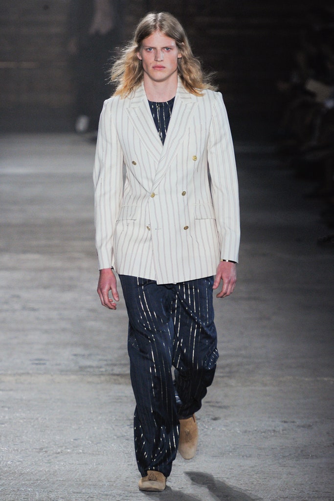 striped white tailored blazer and blue pants