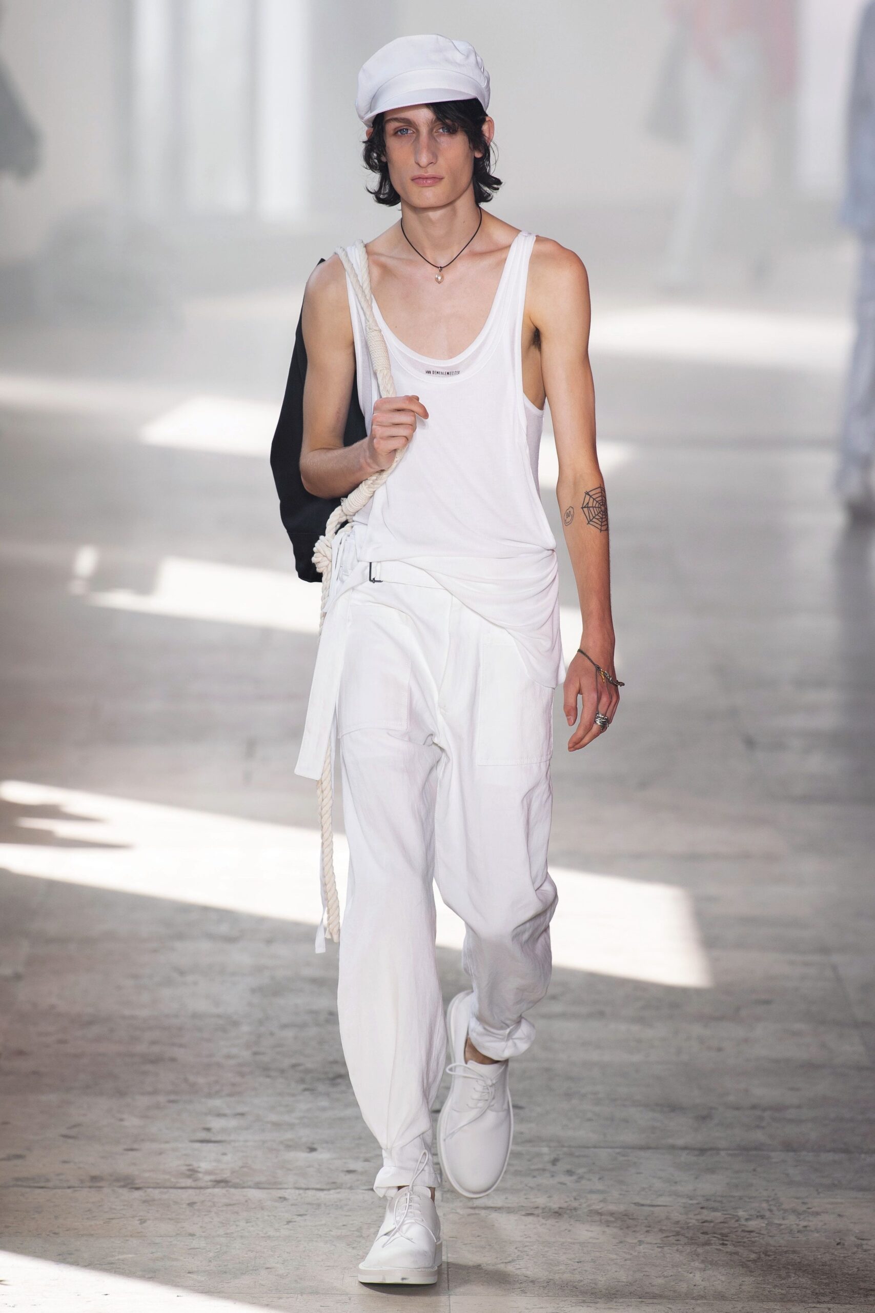 white tank-top and relaxed pants