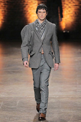 gray tailored suit with brown shoes