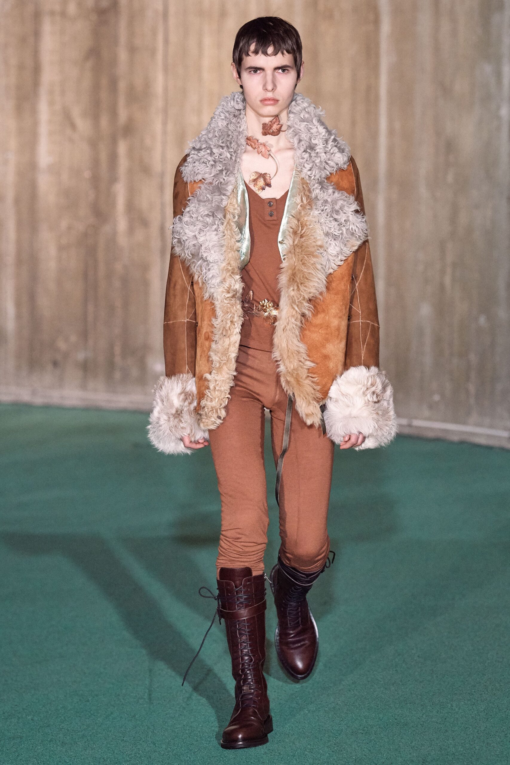 brown leather fur jacket and catsuit