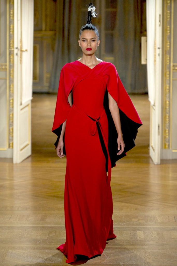 red and black draped gown