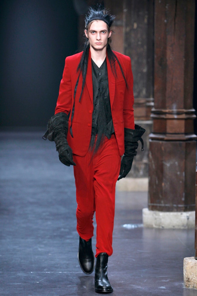 red fitted suit with gloves