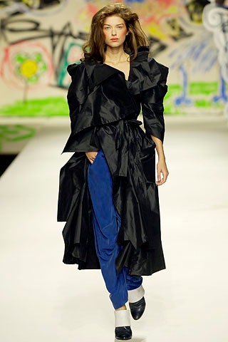 black draped midi dress with blue pants