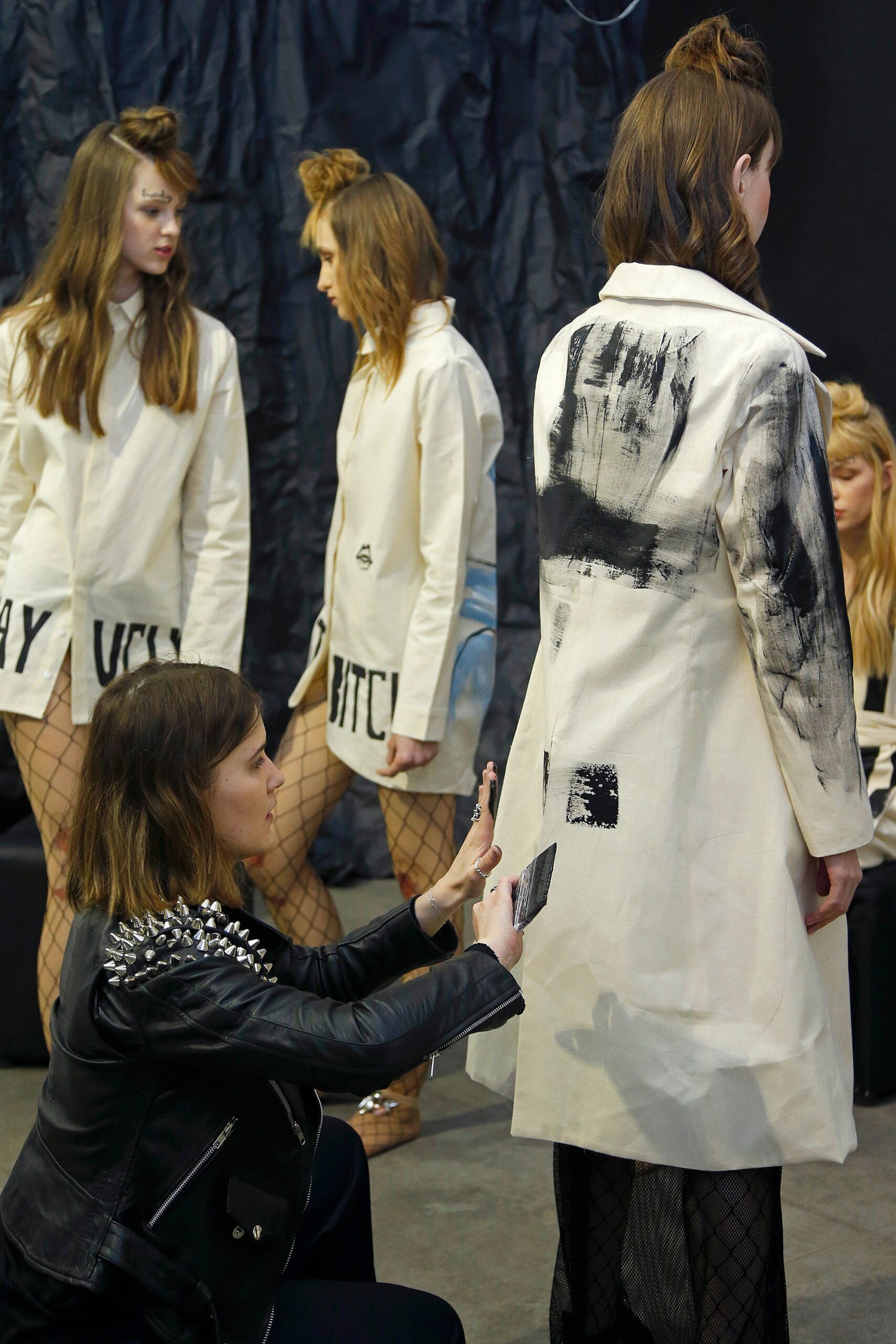 white coat and black leather jacket