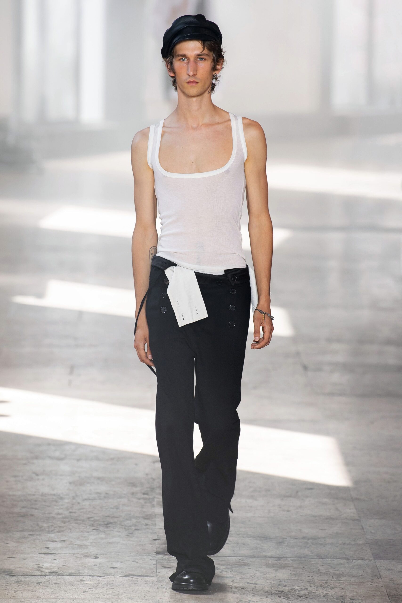 white fitted tank-top and black pants