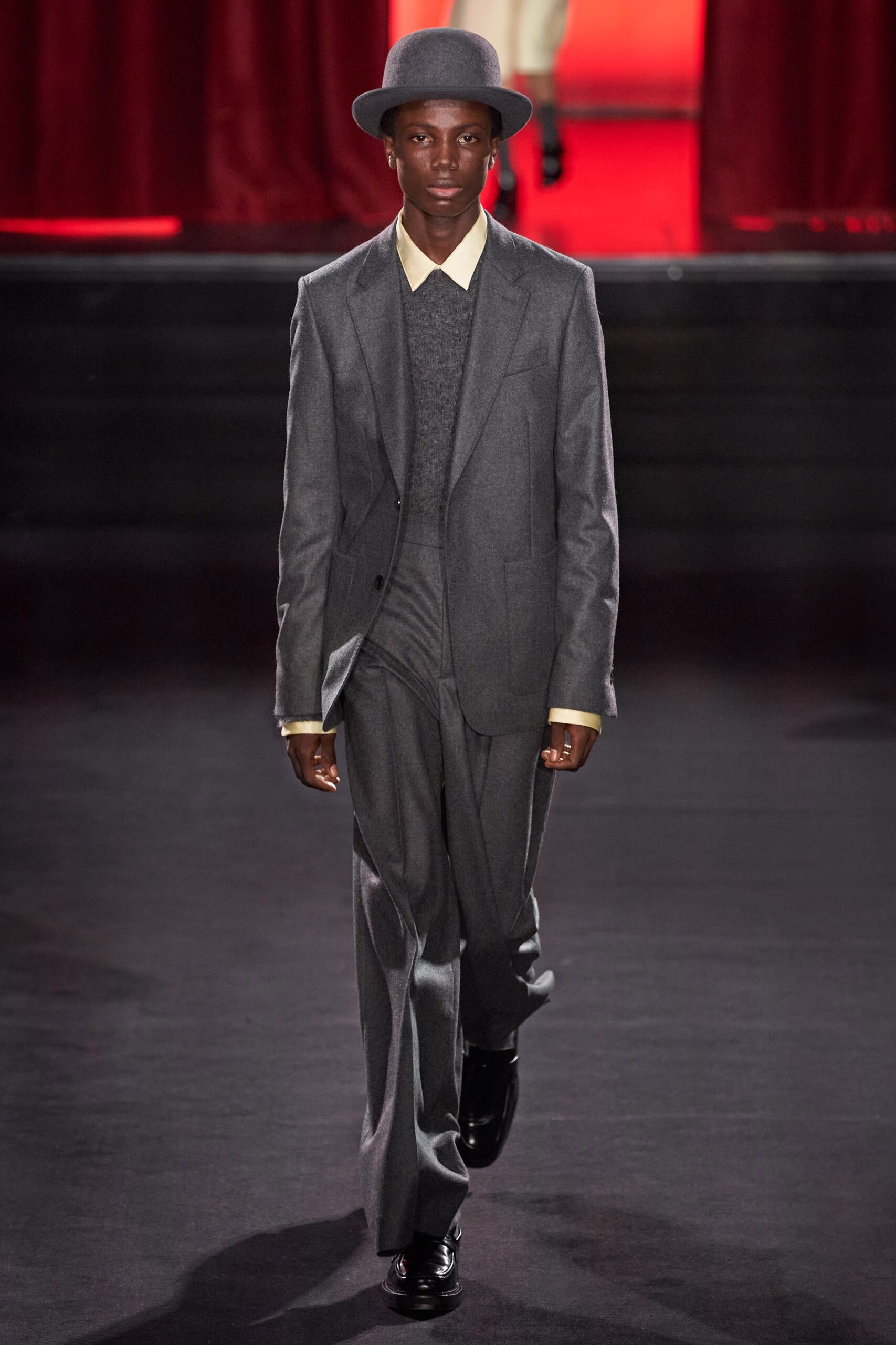 gray tailored suit with hat