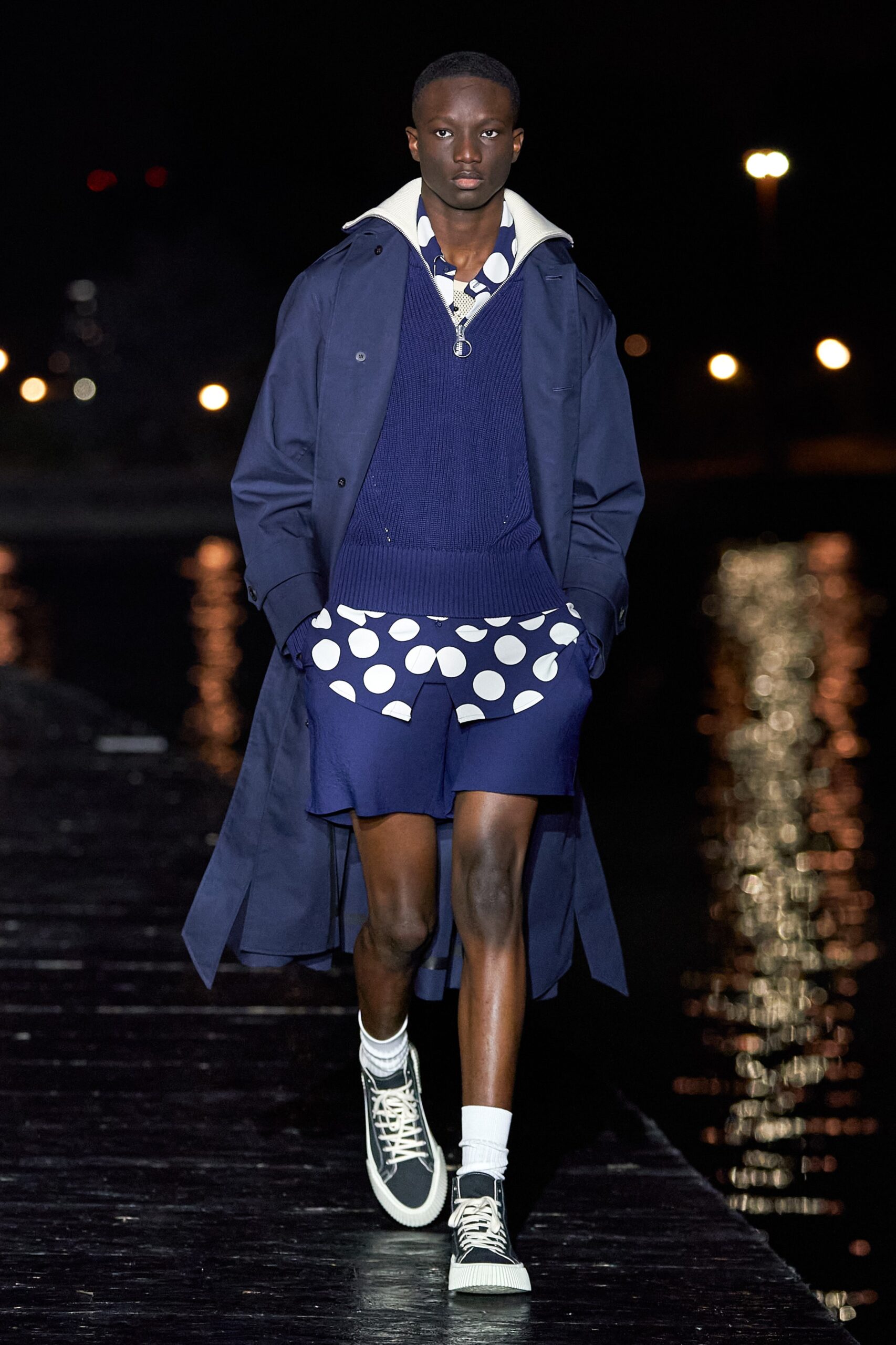 navy coat blue sweater polka-dot skirt