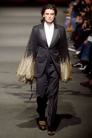 black tailored suit with layered sleeves