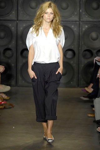 white silk relaxed blouse and black pants