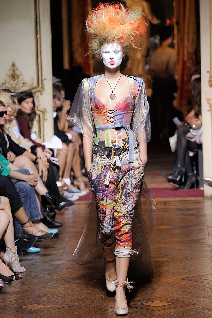 transparent vinyl jacket with multi-colored outfit