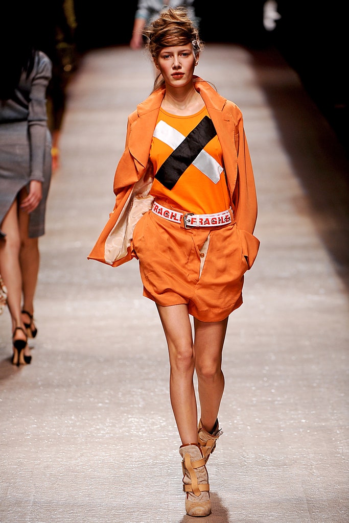 orange fitted blazer and shorts