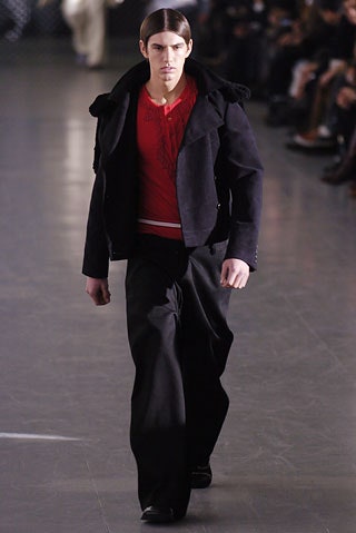 black jacket red shirt relaxed pants