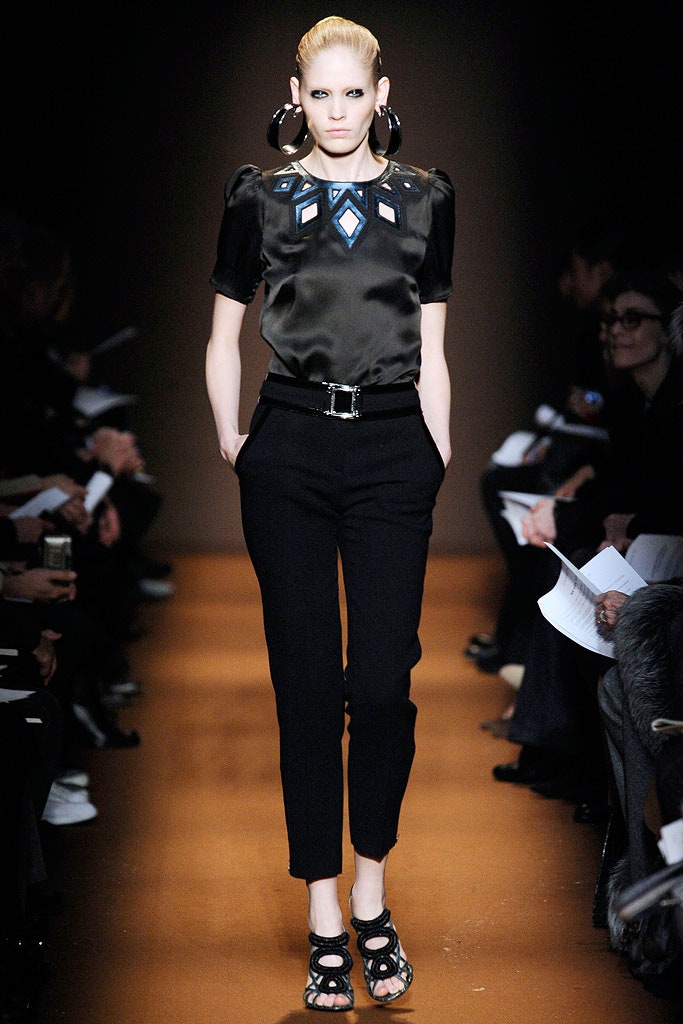 black silk fitted top with tailored pants
