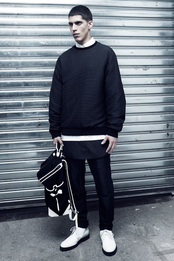 black sweater white shirt black pants