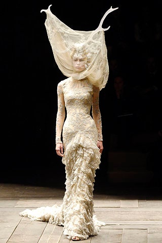 beige lace fitted gown with headpiece
