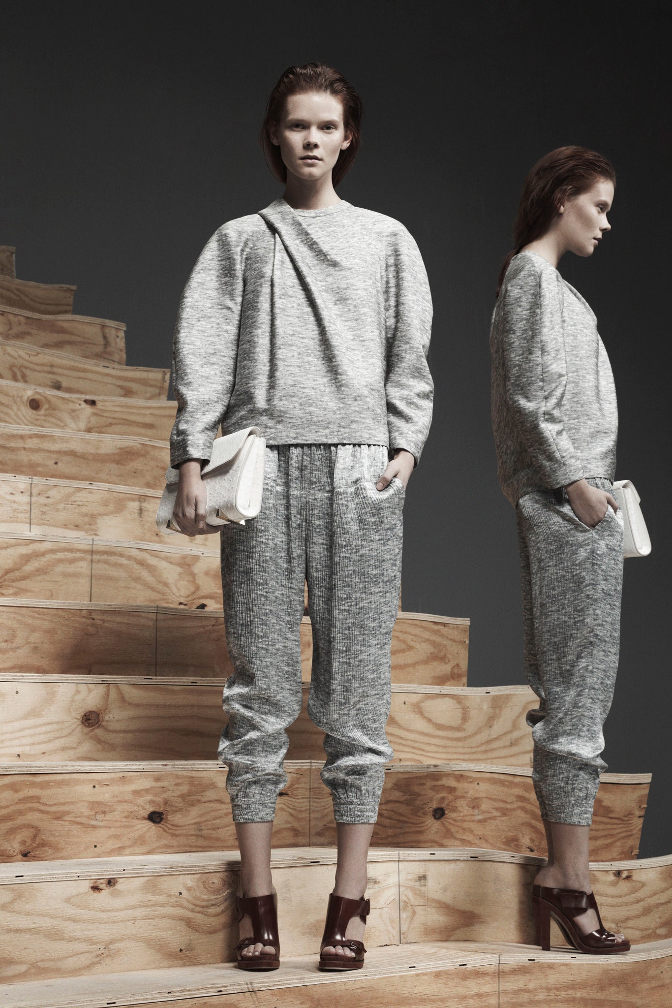 gray relaxed sweater with fitted pants