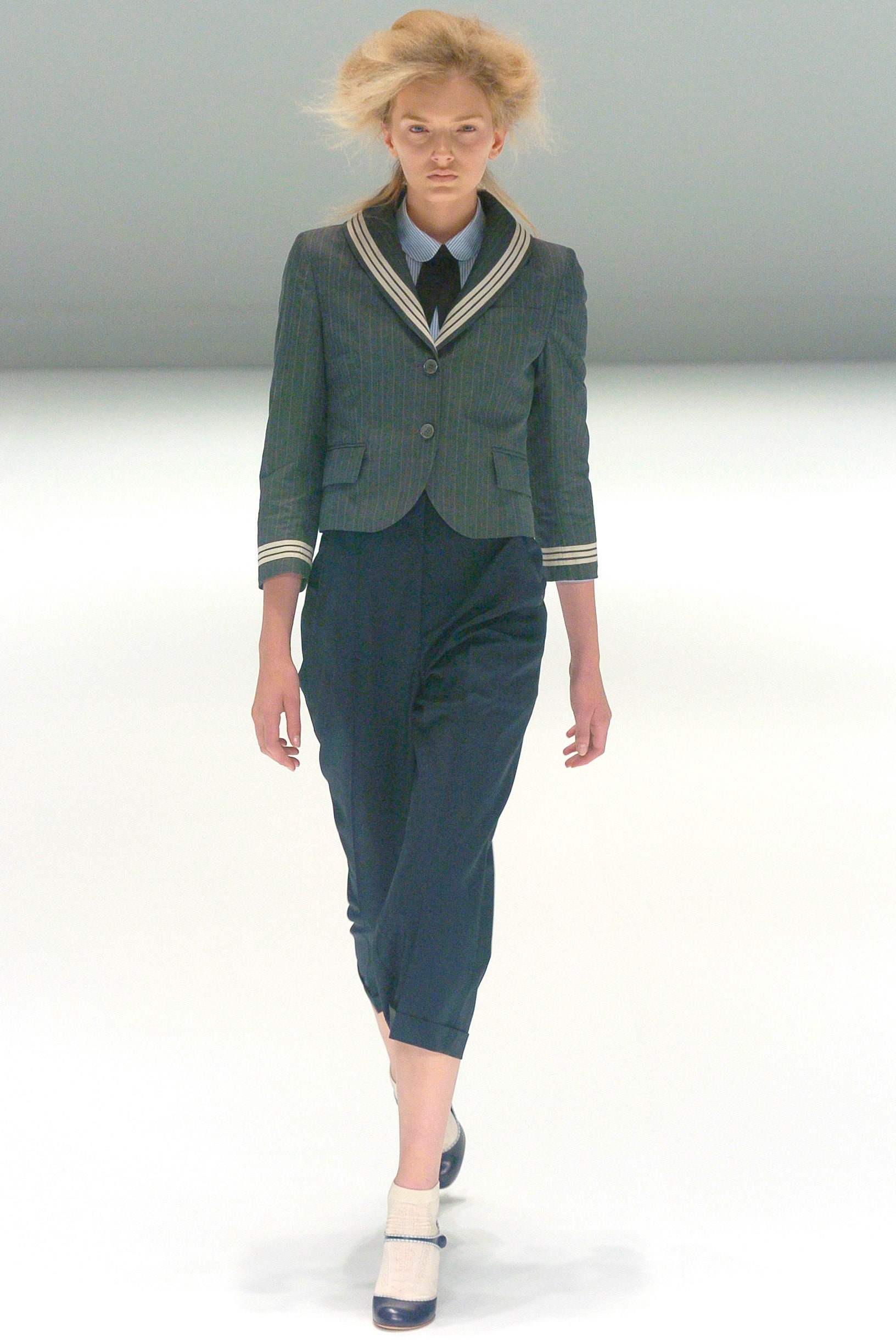 blue striped tailored blazer and black relaxed pants