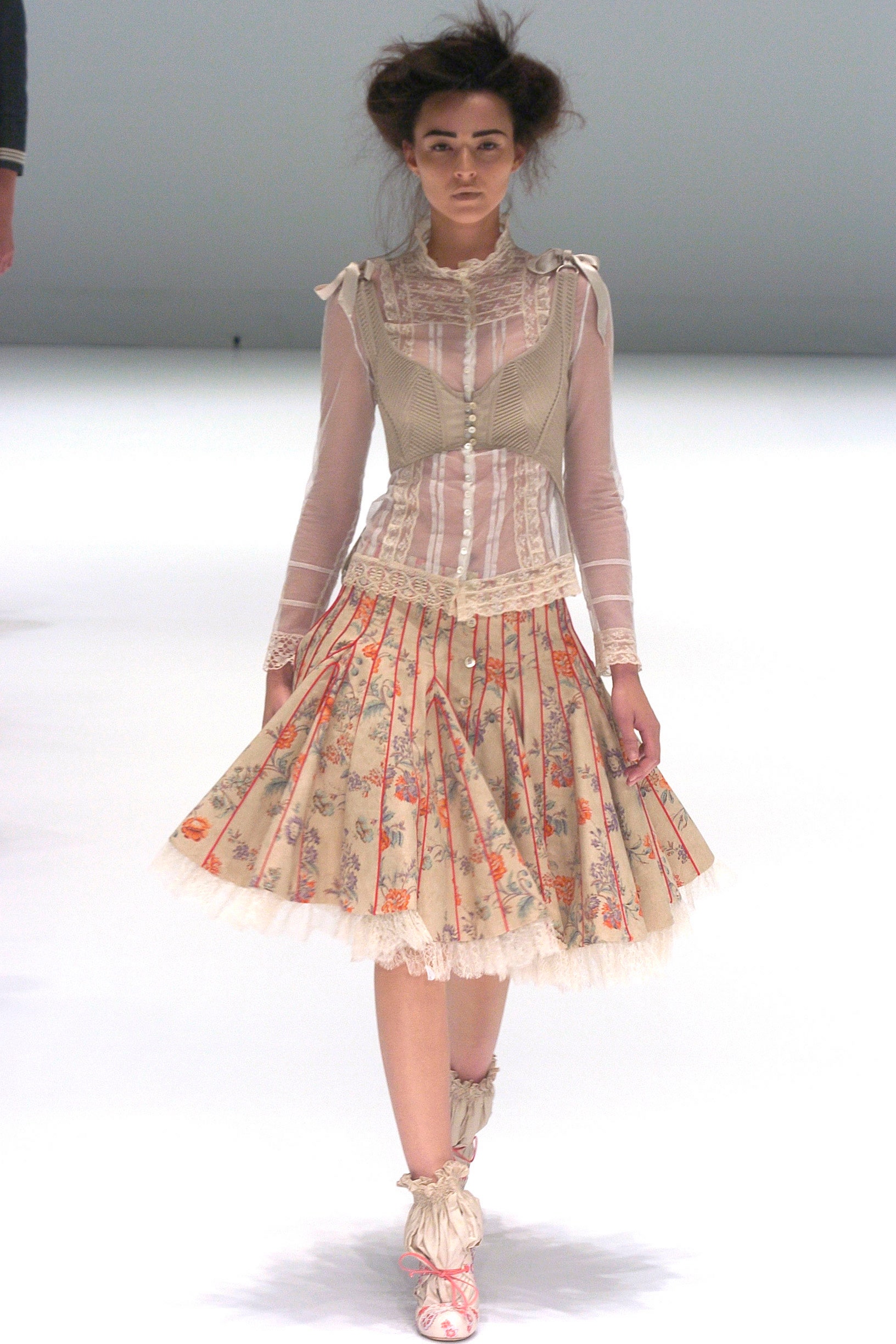 white silk blouse beige corset multi pleated skirt