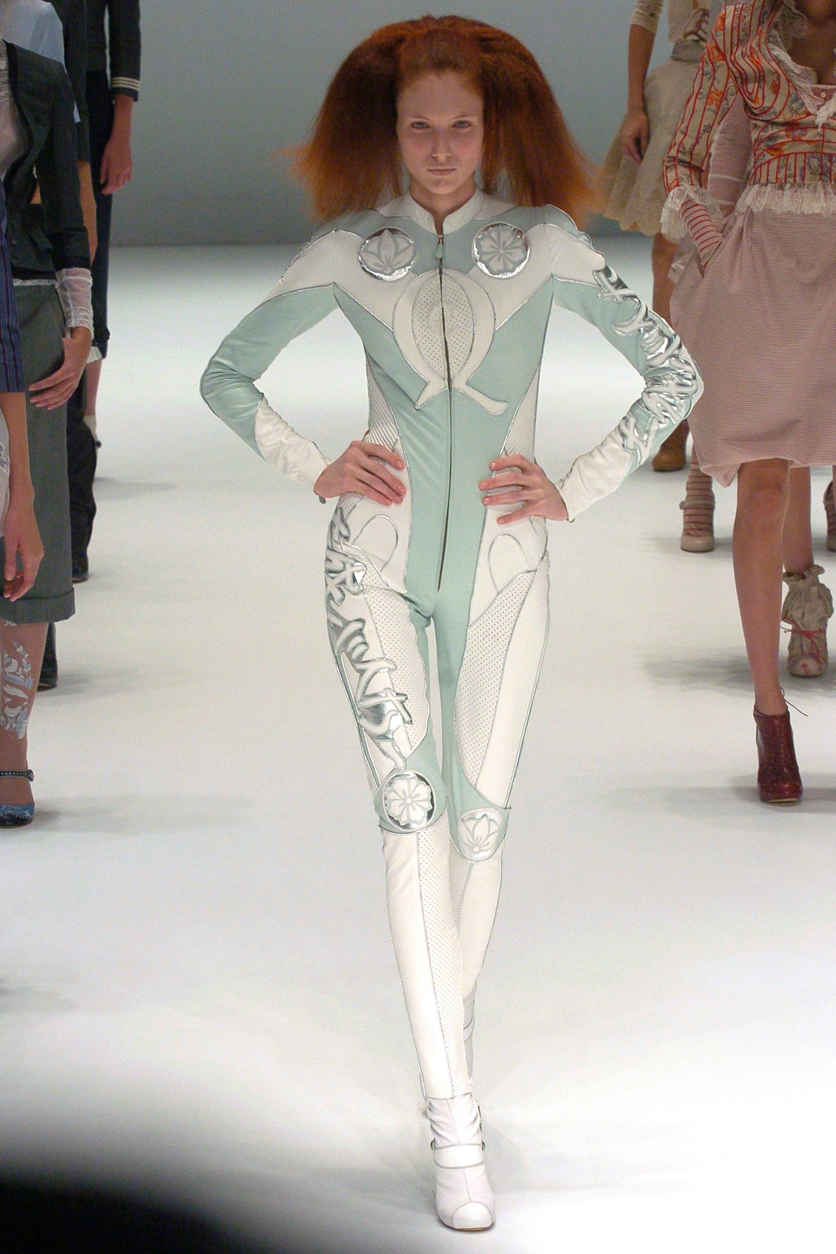 fitted white and blue vinyl catsuit